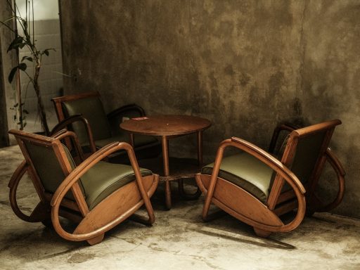 a group of chairs and a table in a room