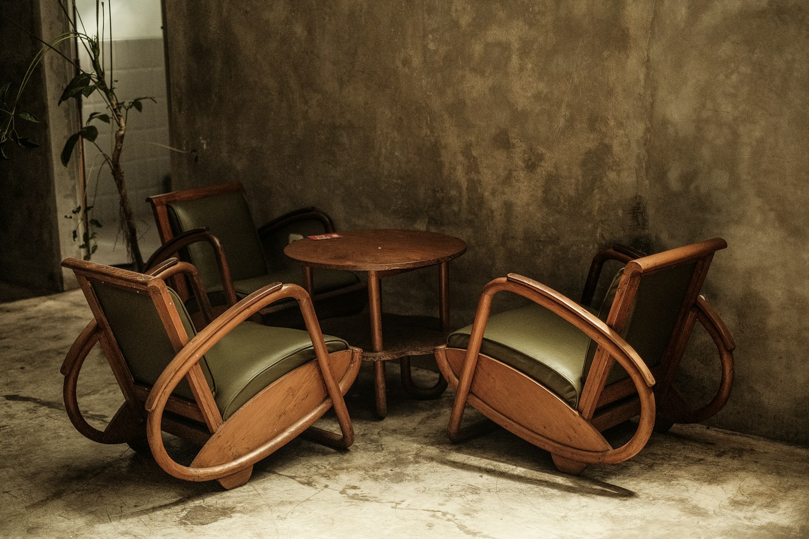 a group of chairs and a table in a room